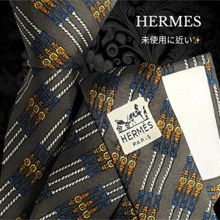 エルメス(Hermes)のHERMES ネクタイ ブラウン系 ストライプ ベルト柄 フランス製(ネクタイ)