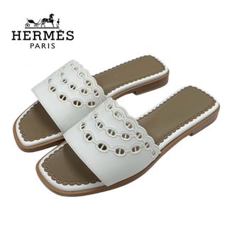 エルメス(Hermes)のエルメス HERMES ガエル サンダル 靴 シューズ レザー ホワイト 白 フラットサンダル ミュール シェーヌダンクル(サンダル)