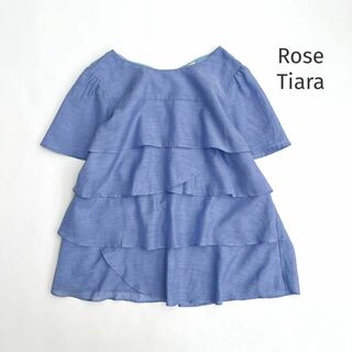 ローズティアラ(Rose Tiara)のローズティアラ＊ティアードフリルブラウス　バックリボン　ブルー　サイズ42(シャツ/ブラウス(半袖/袖なし))