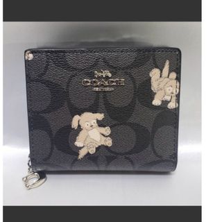 COACH - 売り切り。一斉値下げ。コーチ　ハッピードッグ　シグネチャー　二つ折り財布