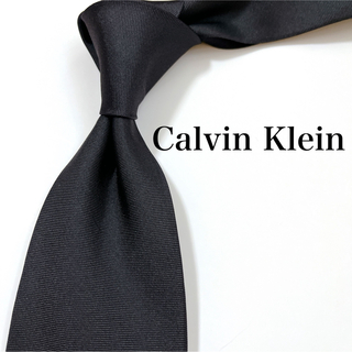 カルバンクライン(Calvin Klein)の美品 カルバンクライン ネクタイ ハイブランド ソリッドタイ 無地 光沢 黒色(ネクタイ)
