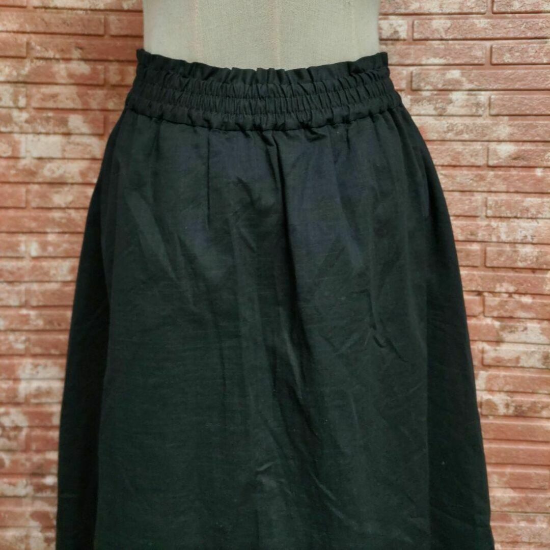 Discoat(ディスコート)のDiscoat ディスコート 総ゴム アシンメトリー コットンスカート 黒 M レディースのスカート(ひざ丈スカート)の商品写真