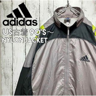 アディダス(adidas)の90sビンテージ万国旗タグUS古着 アディダス短丈ナイロンジャケット【493】(ナイロンジャケット)