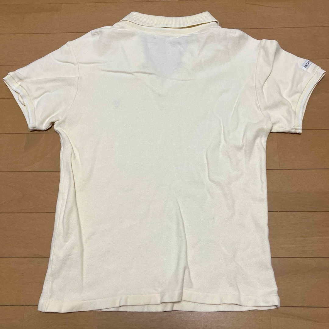 ポロシャツ　クリームイエロー レディースのトップス(ポロシャツ)の商品写真