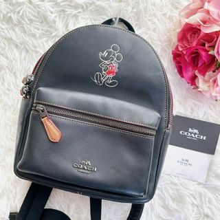 コーチ(COACH)の美品★コーチ　ディズニー　リュック　ミニ　ブラック　チャーム付き(リュック/バックパック)