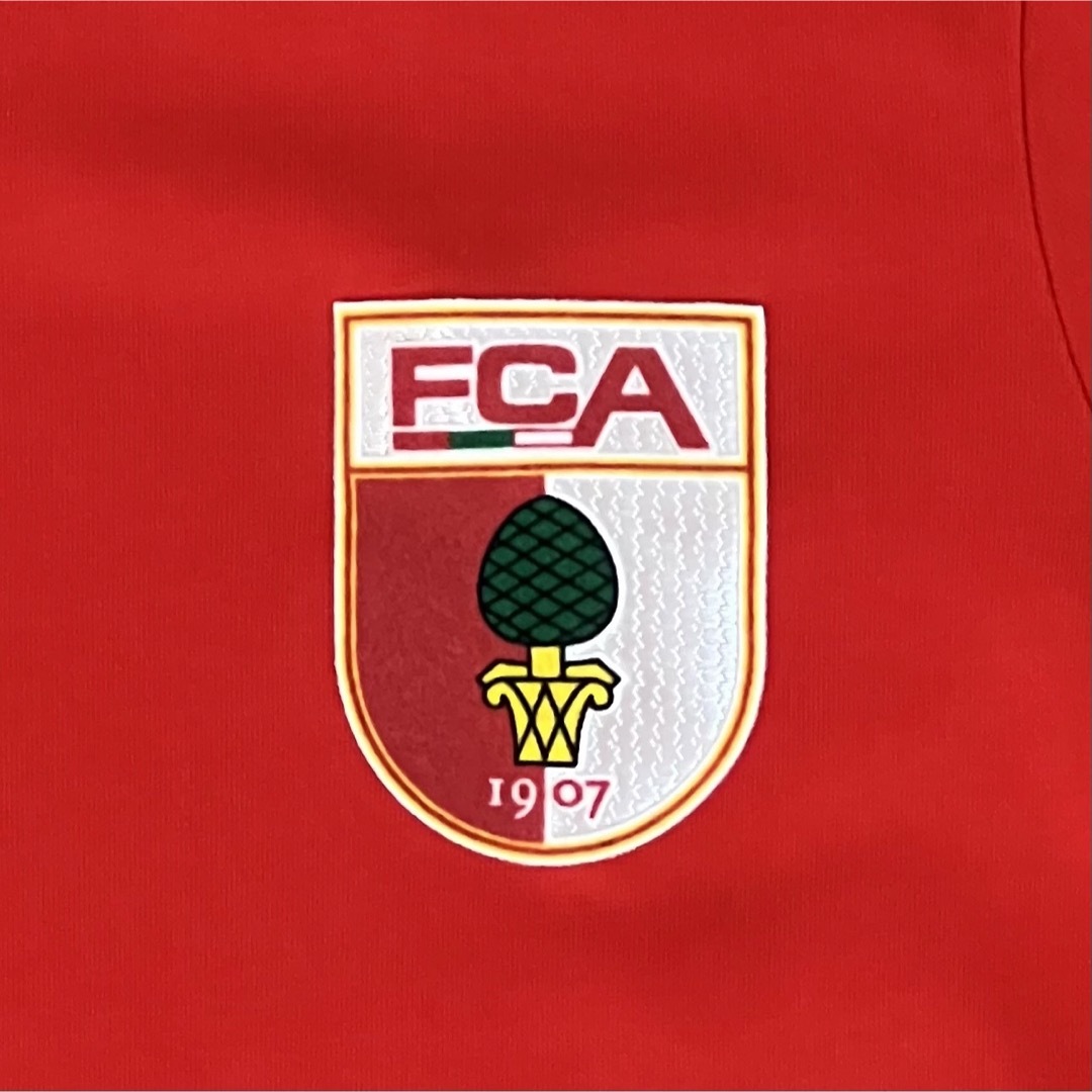 NIKE(ナイキ)のNIKE DRI-FIT ナイキ ブンデスリーガ FC アウクスブルク Tシャツ メンズのトップス(Tシャツ/カットソー(半袖/袖なし))の商品写真