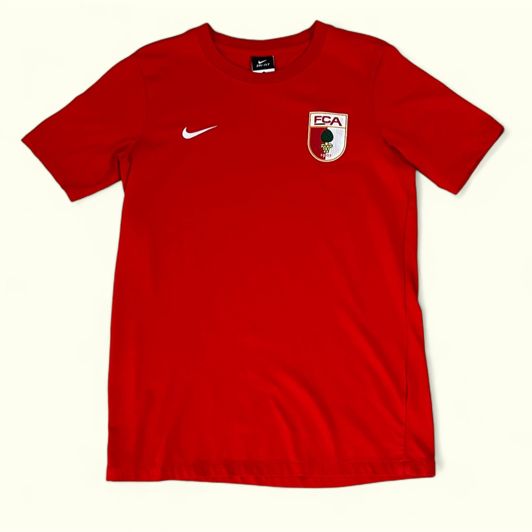 NIKE(ナイキ)のNIKE DRI-FIT ナイキ ブンデスリーガ FC アウクスブルク Tシャツ メンズのトップス(Tシャツ/カットソー(半袖/袖なし))の商品写真