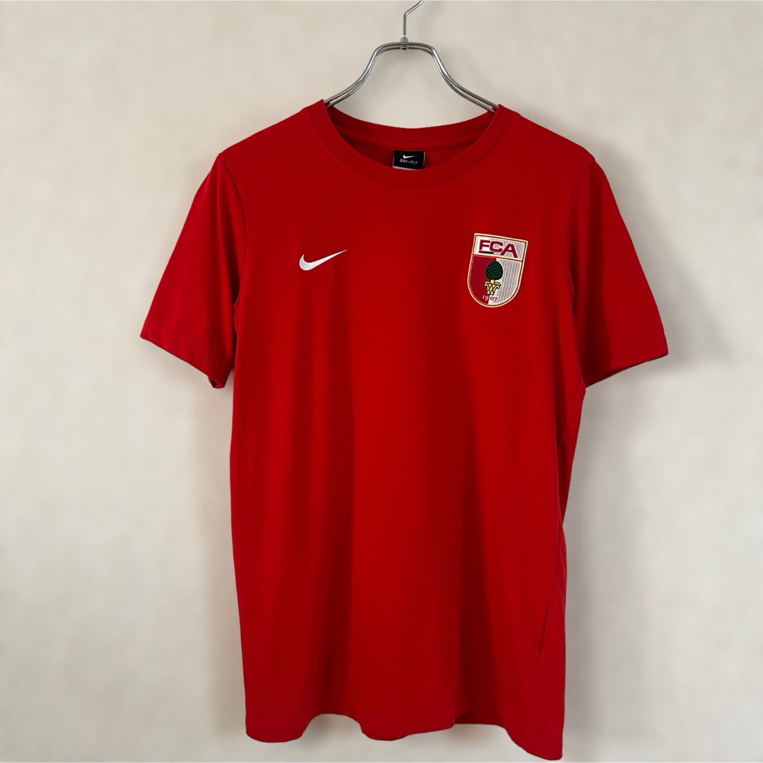 NIKE(ナイキ)のNIKE DRI-FIT ナイキ ブンデスリーガ FC アウクスブルク Tシャツ メンズのトップス(Tシャツ/カットソー(半袖/袖なし))の商品写真