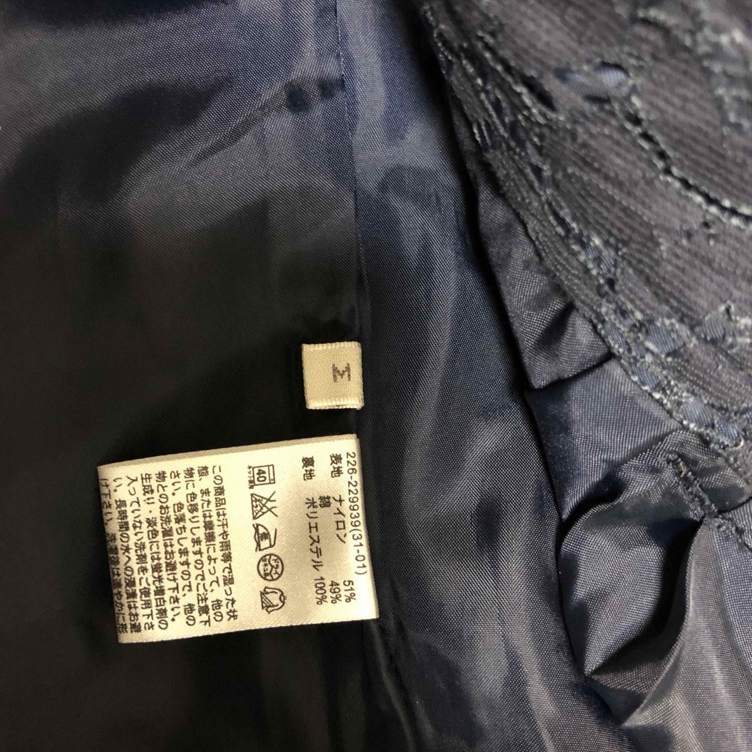 GU(ジーユー)のGU ジーユー きれいめパンツ (総レース テーパード ネイビー 裾ダブル)わ レディースのパンツ(クロップドパンツ)の商品写真