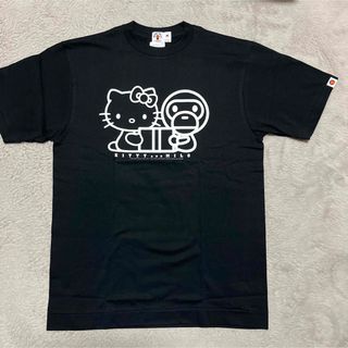 アベイシングエイプ(A BATHING APE)のAPE BAPE KAWS HELLO KITTY キティちゃん　tシャツ　 M(Tシャツ/カットソー(半袖/袖なし))