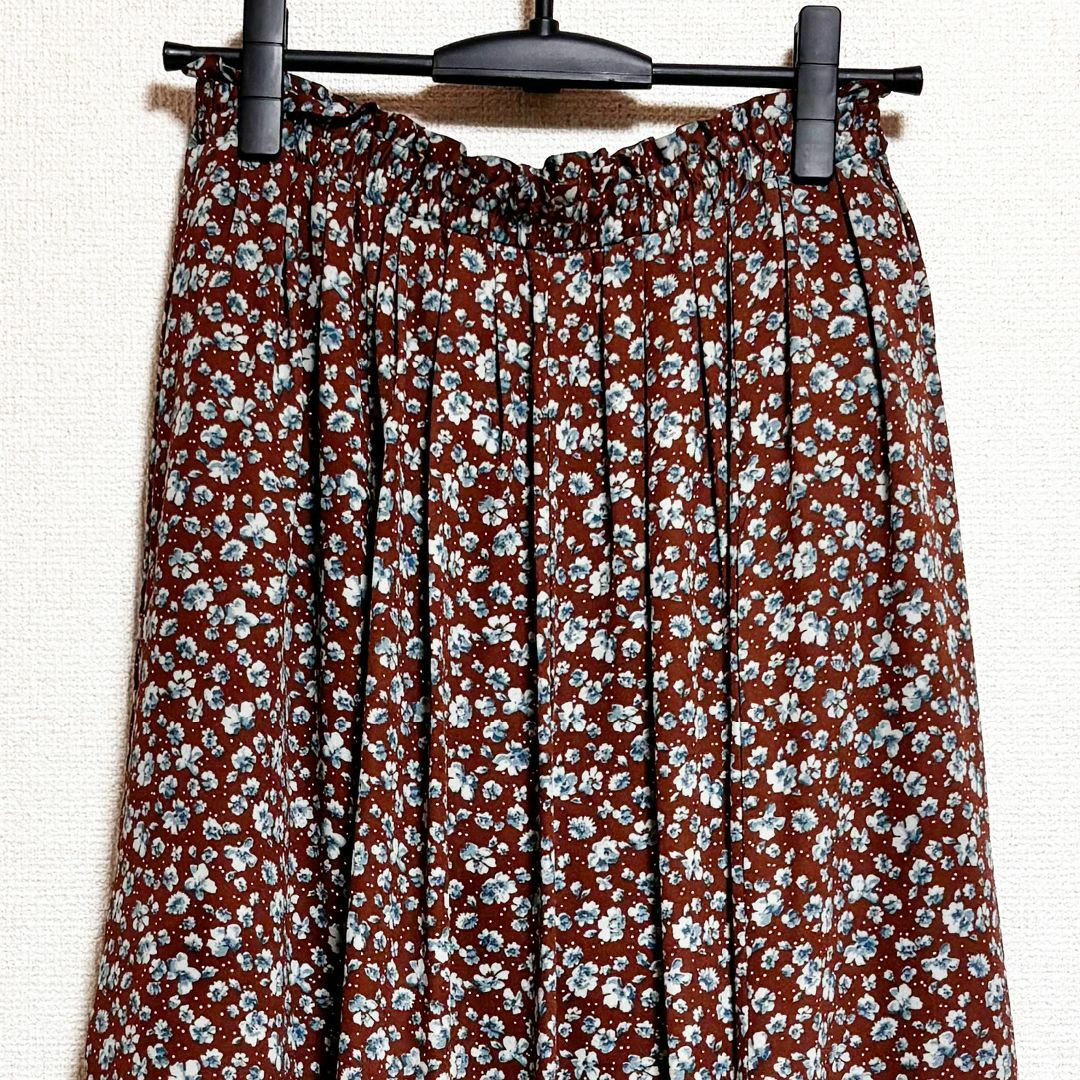 Simplicite(シンプリシテェ)のSIMPLICITE　シンプリシテェ ロングスカート　花柄　茶色　フレア レディースのスカート(ロングスカート)の商品写真