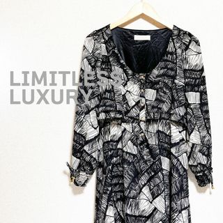 リミットレスラグジュアリー(LIMITLESS LUXURY)のLIMITLESS LUXURY ミニワンピ　黒　アイボリー　総柄　長袖　フリル(ミニワンピース)