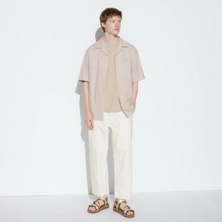 ユニクロ(UNIQLO)のユニクロ リラックスアンクルジーンズ オフホワイト 新品未使用(デニム/ジーンズ)