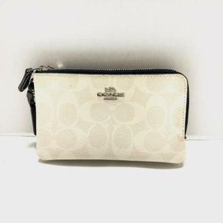 コーチ(COACH)のCOACH(コーチ) リストレット シグネチャー柄 F87591 アイボリー×ベージュ×ダークネイビー PVC(塩化ビニール)×レザー(ポーチ)