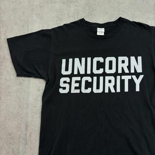 ヴィンテージ(VINTAGE)のUNICORN SECURITY　企業ロゴ　Tシャツ　古着　ブラック　L(Tシャツ/カットソー(半袖/袖なし))