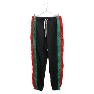 グッチ(Gucci)のGUCCI グッチ ジップスリット付き ナイロンパンツ トラックパンツ ブラック 575549(その他)