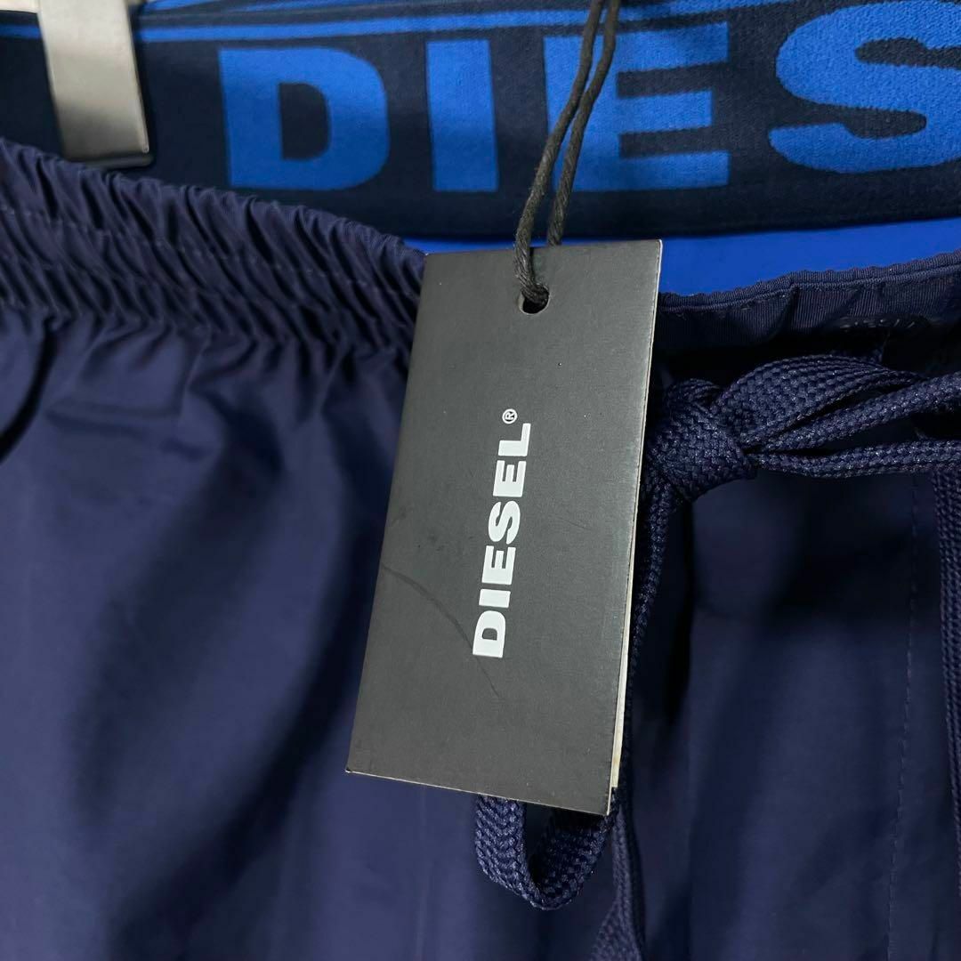 DIESEL(ディーゼル)の新品 タグ付き 水着 水陸両用 サーフパンツ ショートパンツ 重ねばき風 メンズ メンズの水着/浴衣(その他)の商品写真