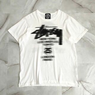 マスターマインドジャパン(mastermind JAPAN)のA13160 ステューシー×マスターマインド　ぼかしロゴTシャツ　ホワイト　L(Tシャツ/カットソー(半袖/袖なし))