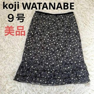 極美品　koji WATANABE 柄スカート　黒　ティアード　９号　お花(ひざ丈スカート)