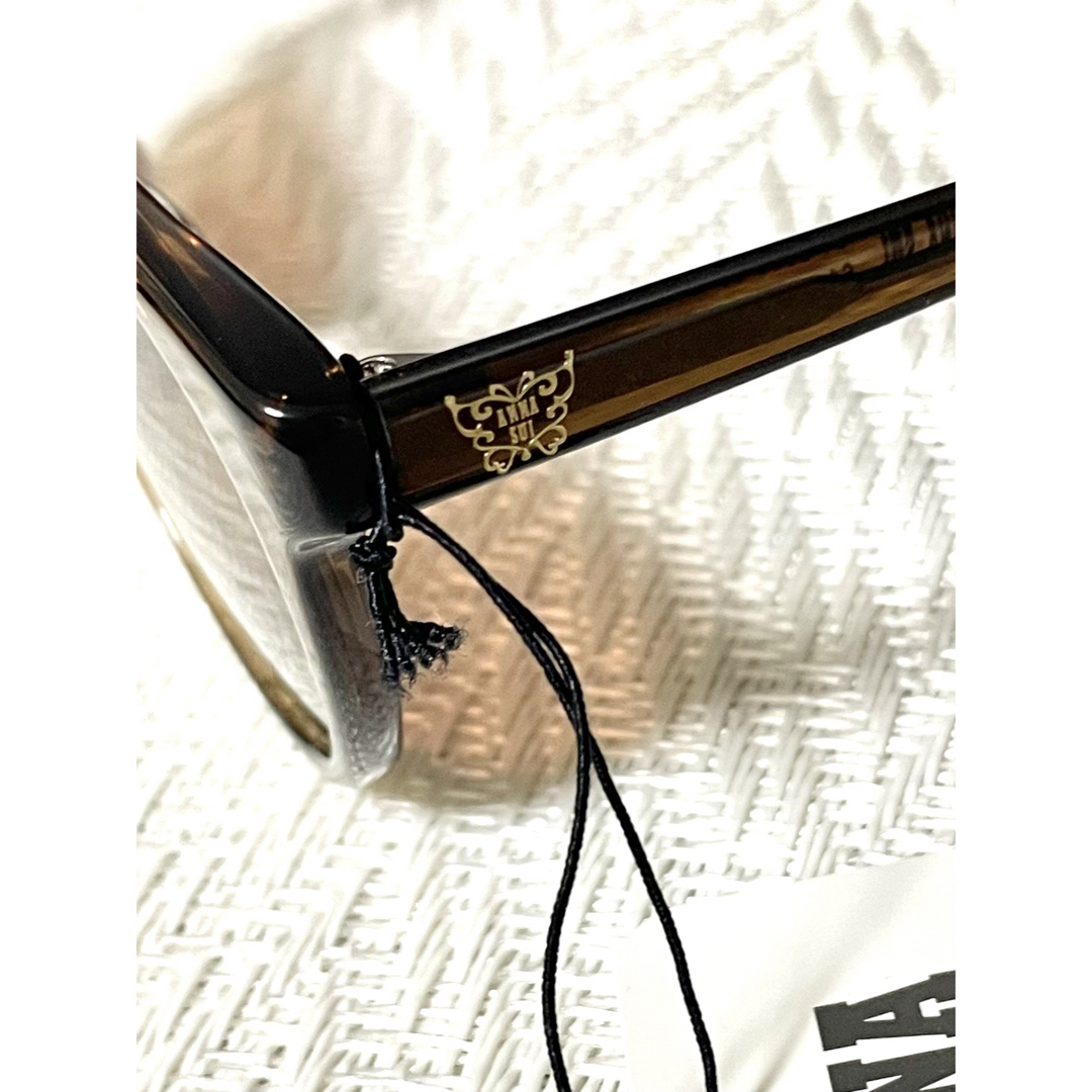 ANNA SUI(アナスイ)のアナスイ　サングラス　ANNA SUI  偏光レンズ　ブラウン　ケース付き レディースのファッション小物(サングラス/メガネ)の商品写真