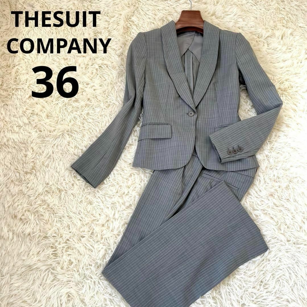 THE SUIT COMPANY(スーツカンパニー)のザスーツカンパニー　ストライプ　パンツスーツ　ライトグレー　36 S レディースのフォーマル/ドレス(スーツ)の商品写真