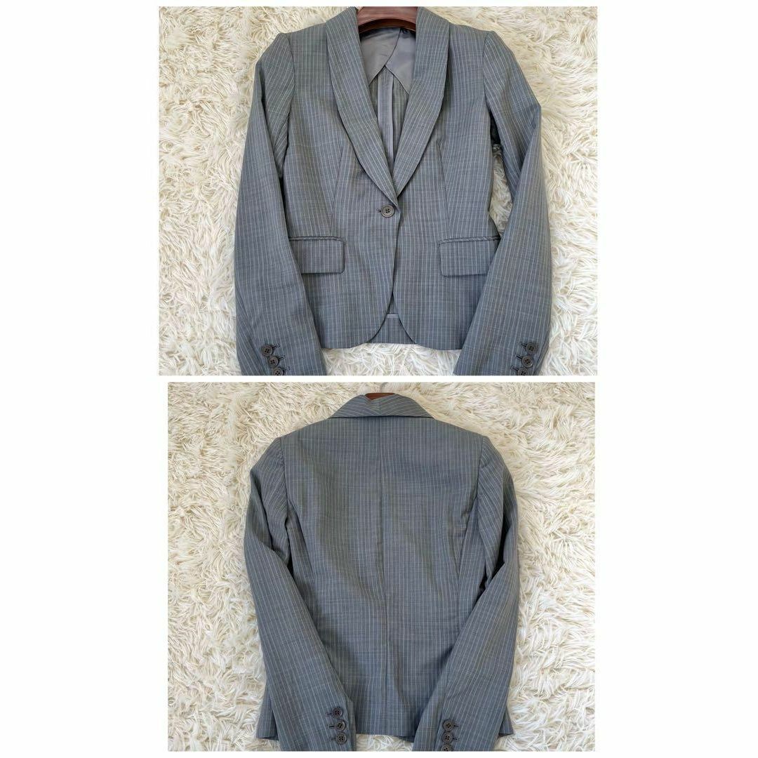 THE SUIT COMPANY(スーツカンパニー)のザスーツカンパニー　ストライプ　パンツスーツ　ライトグレー　36 S レディースのフォーマル/ドレス(スーツ)の商品写真