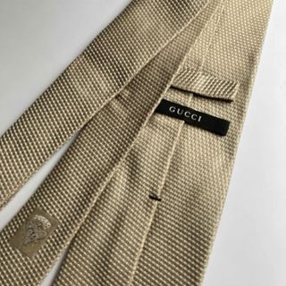 グッチ(Gucci)のGUCCI silk100% GOLD silver ネクタイ(ネクタイ)