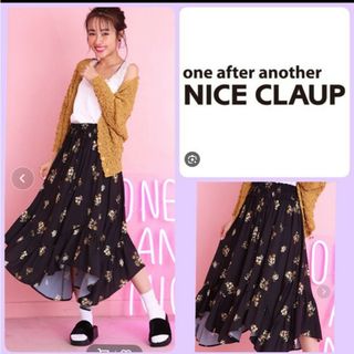 one after another NICE CLAUP - ♡NICE CLAUP アシメ裾花柄フレアロングスカートブラック黒フェミニン