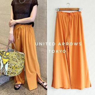 ユナイテッドアローズ(UNITED ARROWS)の美品 ユナイテッドアローズ ジャージー イージーパンツ オレンジ 36(カジュアルパンツ)