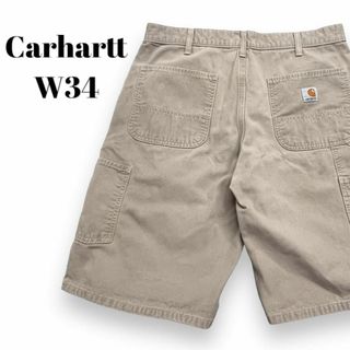 カーハート(carhartt)のカーハート　ワークパンツ　ダック地　ショートパンツ　古着　ベージュ系　W34(ショートパンツ)