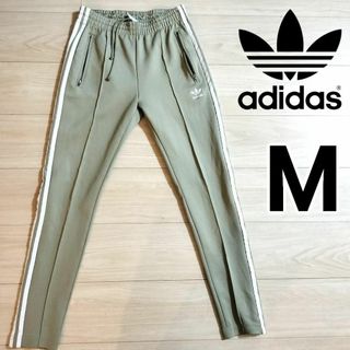 アディダス(adidas)のアディダス カーキベージュ スーパースター トラックパンツ ジャージ 女性M(その他)