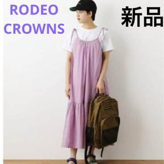 ロデオクラウンズワイドボウル(RODEO CROWNS WIDE BOWL)の新品 タグ付き ロデオクラウンズ キャミワンピース パープル フリーサイズ 綿ぬ(ロングワンピース/マキシワンピース)