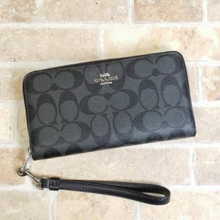 コーチ(COACH)の未使用 コーチ ☆ シグネチャーキャンバス ラウンドジップ 長財布 ストラップ付(財布)