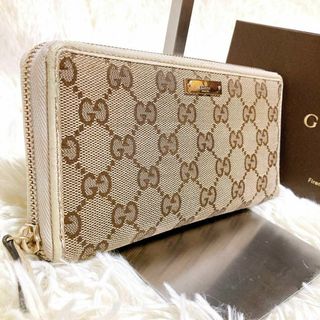 グッチ(Gucci)のグッチ 長財布 ラウンドファスナー GGキャンバス×レザー ロゴプレート 白系(財布)