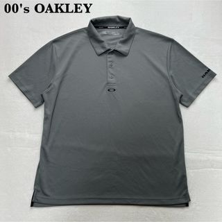 Oakley - 【y2k】00's OAKLEY センターロゴ ポロシャツ メタルボタン