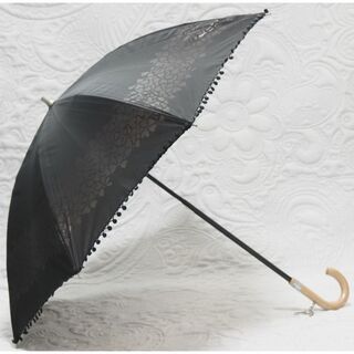 イヴサンローラン(Yves Saint Laurent)の美品 晴雨兼用 イヴサンローラン 涼しげ透け感花柄 ハートロゴチャーム付き 長傘(傘)