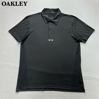 オークリー(Oakley)の【極美品】y2k OAKLEY オークリー センターロゴ ポロシャツ グレー L(ポロシャツ)