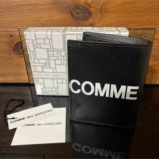 COMME des GARCONS - 新品未使用 タグ付きCOMME des GARCONS 二つ折り財布 レザー 黒