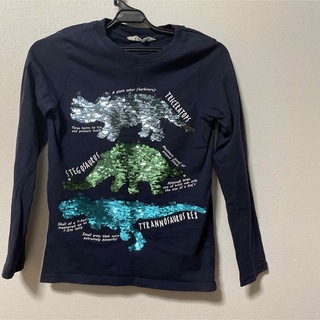 エイチアンドエム(H&M)のスパンコール付きロンT 恐竜柄(Tシャツ/カットソー)
