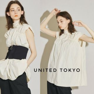 UNITED TOKYO - UNITED TOKYO ハイマルチタフタ シャーリングブラウス アイボリー