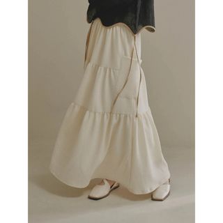 ollun オルン pocopoco tiered skirt  ivory(ロングスカート)