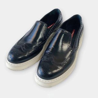 プラダ(PRADA)のPRADA プラダ　厚底 ローファー　ウィングチップ　シューズ　スリッポン　黒(ローファー/革靴)