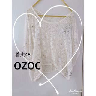 OZOC - 【OZOC】ポンチョタイプビジュー付総レーストップス　ホワイト