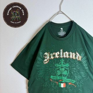 ヴィンテージ(VINTAGE)の【半袖Tシャツ 英字 クローバー 十字架 デザイン ヴィンテージ 古着 緑】(Tシャツ/カットソー(半袖/袖なし))