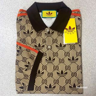 グッチ(Gucci)の国内正規品 22～23 新品未使用 L グッチ×アディダス 総柄ポロシャツ(ポロシャツ)