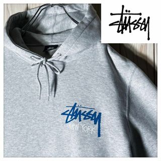 ステューシー(STUSSY)の【限定 M】ステューシー NY ストックロゴ スウェット パーカー 灰(パーカー)