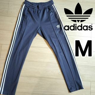 オリジナルス(Originals（adidas）)のアディダス 灰青 ベッケンバウアー トラックパンツ ジャージ 刺繍ロゴ 男性M(その他)