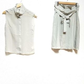 カルバンクライン(Calvin Klein)のCalvinKlein(カルバンクライン) スカートセットアップ サイズ4 XL レディース美品  - ベージュ ストライプ/シースルー/リボン(セット/コーデ)