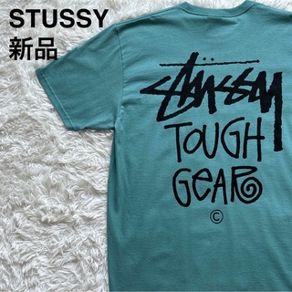 ステューシー(STUSSY)の新品　Stussy Tough Gear ターコイズブルー　tシャツ Lサイズ(Tシャツ/カットソー(半袖/袖なし))
