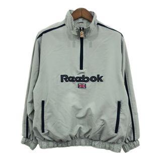 リーボック(Reebok)のReebok リーボック ハーフジップ プルオーバー ジャケット スポーツ ロゴ ライトグレー (メンズ M) 中古 古着 Q8265(その他)